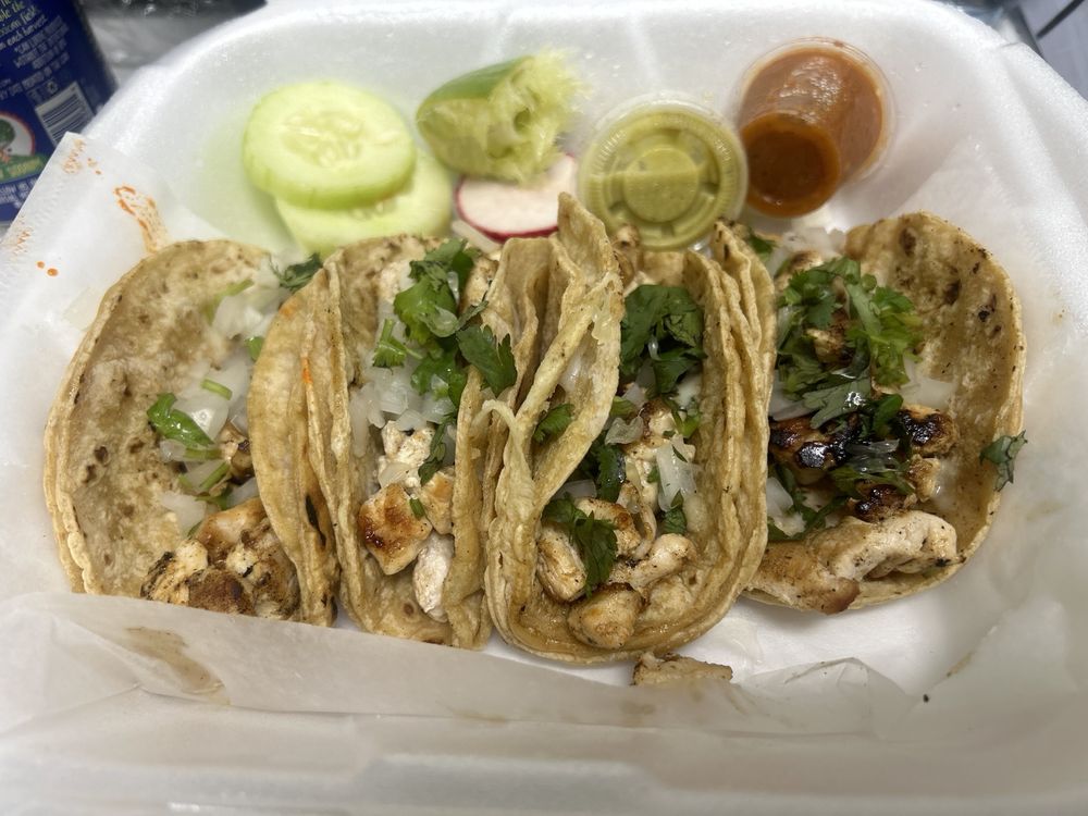 Grilled chicken street tacos made at Los Altos Ranch Market's prepared foods counter